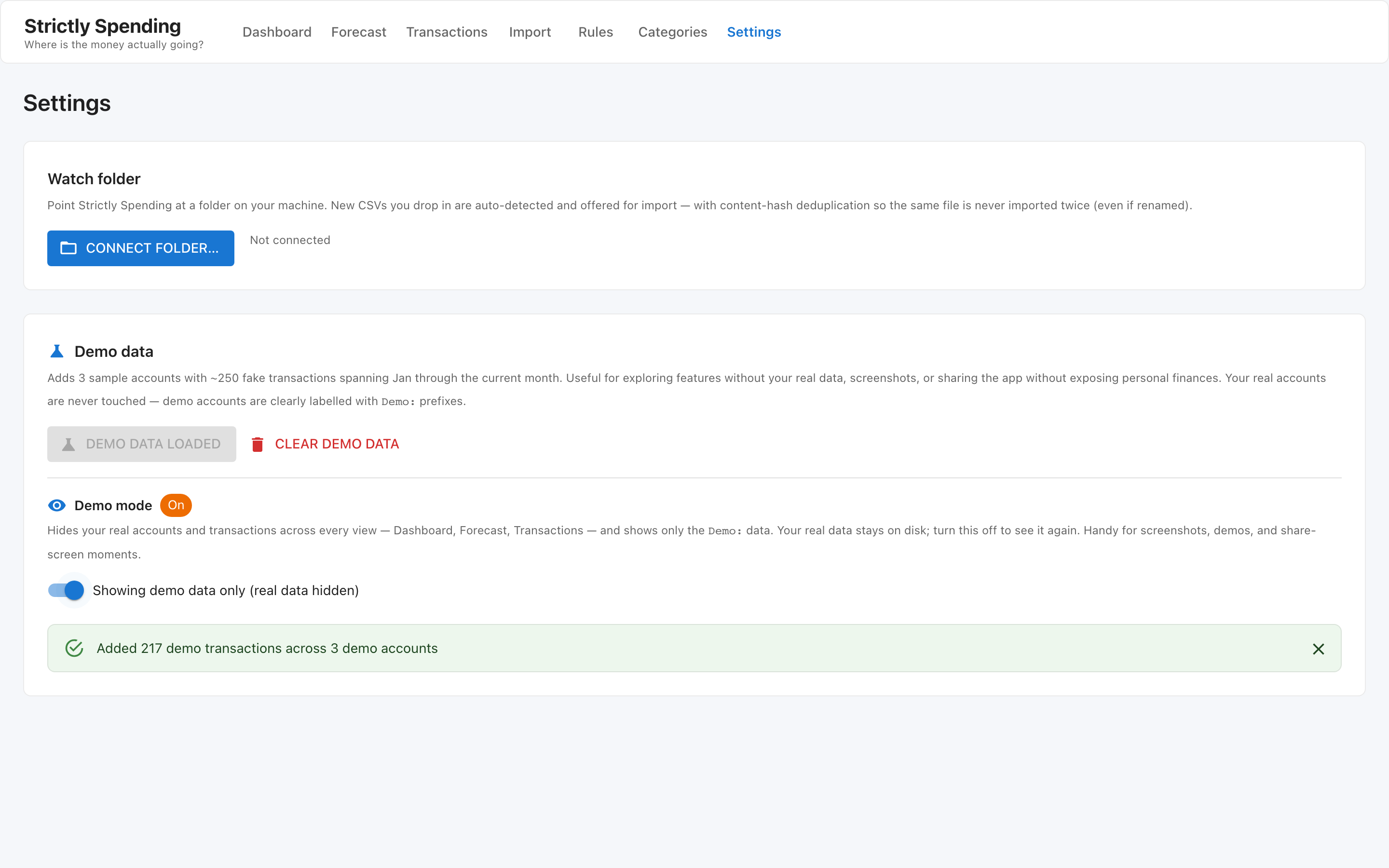 The Settings page. It shows a Watch folder section with a Connect folder button, a Demo data section showing 217 demo transactions loaded, and a Demo mode toggle currently turned on.